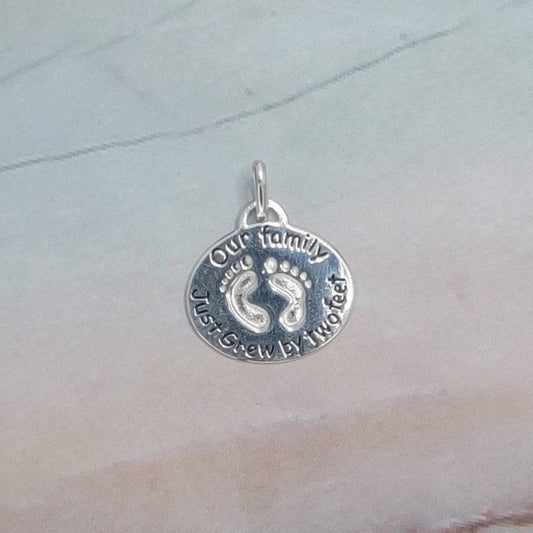 Our Family Just Grew By Two Feet Charm Pendant